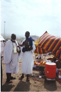 Wali and me at Arafat, with the Mount of Mercy in the distance over my left shoulder.