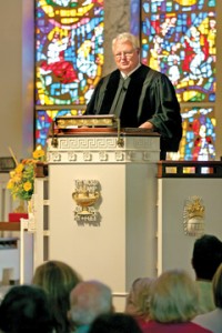 Dr. Ted Bush, senior minister, in pulpit during 25th anniversary of his service at the First Presbyterian Church of Delray Beach.