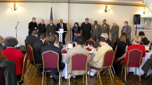 In offering a Prayer for our Nation, Rev. Dixon requested that he be joined at the poduim by fellow members of the Delray Interfaith Clergy who were present.